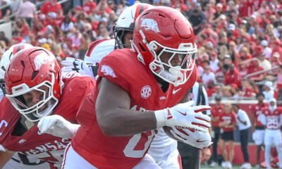 Arkansas Razorbacks running back Braylen Russell runs to the end zone against the Arkansas State Red Wolves