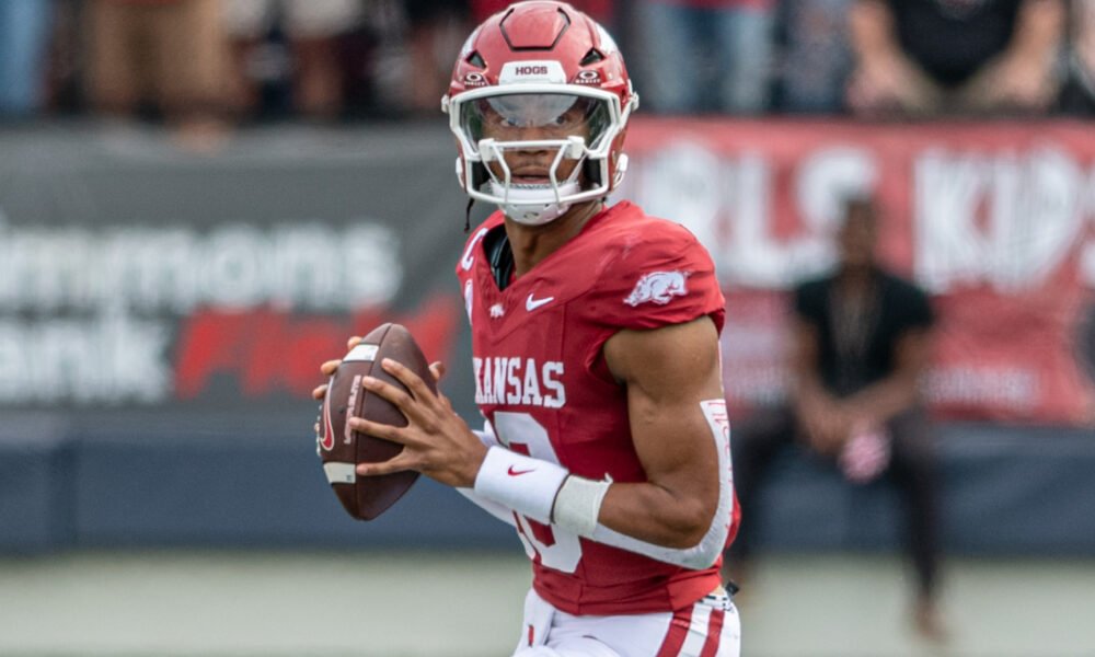 Arkansas Razorbacks quarterback Taylen Green dropping back to pass against the Arkansas State Red Wolves