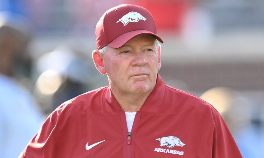 Arkansas Razorbacks offensive coordinator Bobby Petrino during pregame warmups before facing the Ole Miss Rebels