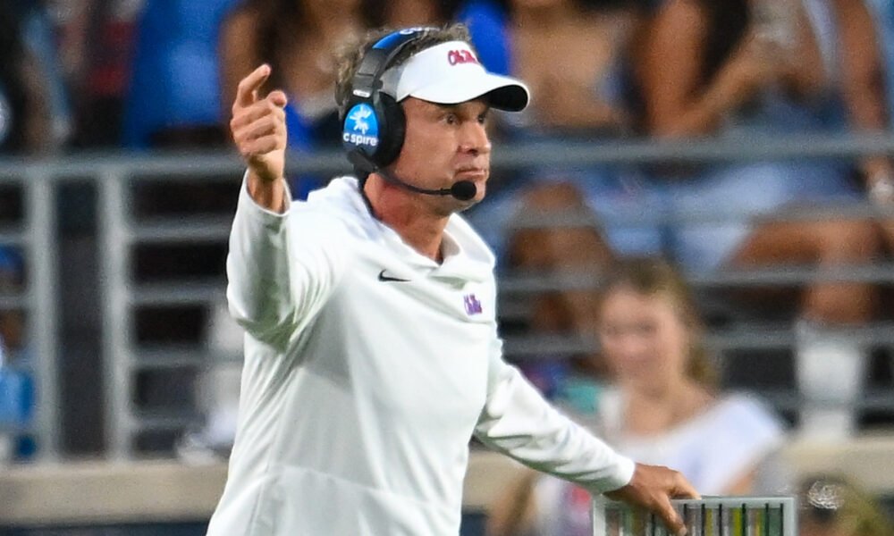 Ole Miss Rebels coach Lane Kiffin on the sidelines against the Arkansas Razorbacks