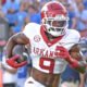 Arkansas Razorbacks wide receiver O'Mega Blake running after making a catch against the Ole Miss Rebels
