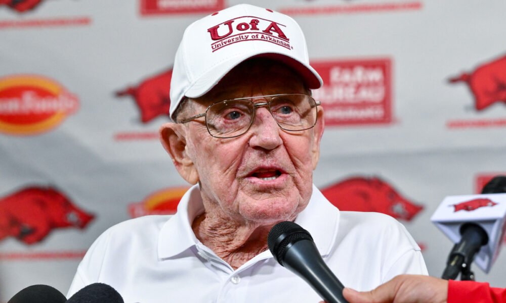 Former Arkansas Razorbacks and Notre Dame Fighting Irish coach Lou Holtz with the media before the two teams' game