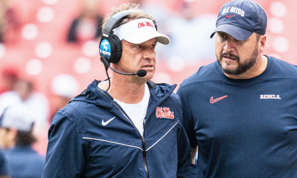 Ole Miss Rebels coach Lane Kiffin on the sidelines against the Arkansas Razorbacks