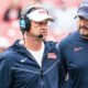 Ole Miss Rebels coach Lane Kiffin on the sidelines against the Arkansas Razorbacks
