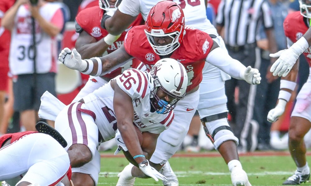 Arkansas Razorbacks defensive lineman Quincy Rhodes making a tackle against Alabama A&M