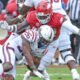 Arkansas Razorbacks defensive lineman Quincy Rhodes making a tackle against Alabama A&M