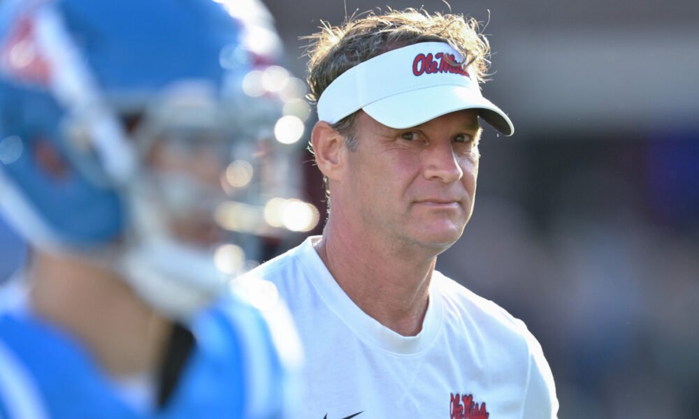 Ole Miss Rebels coach Lane Kiffin in pregame warmups before facing the Arkansas Razorbacks
